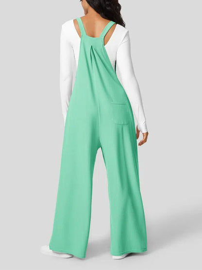 Women's loose solid color button pocket overalls