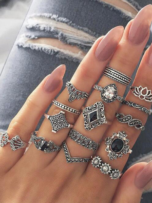 Jewelry 15-piece ring personality hollow lotus sunflower geometric black stone set ring - FashionistaDeal