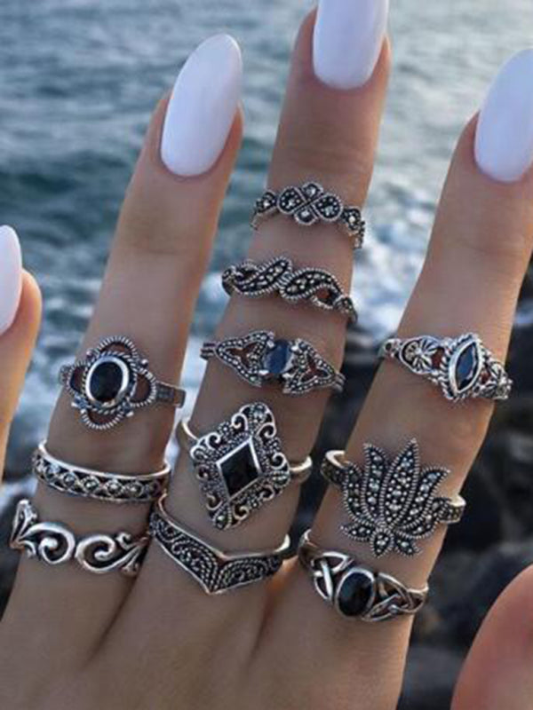 Jewelry 15-piece ring personality hollow lotus sunflower geometric black stone set ring - FashionistaDeal