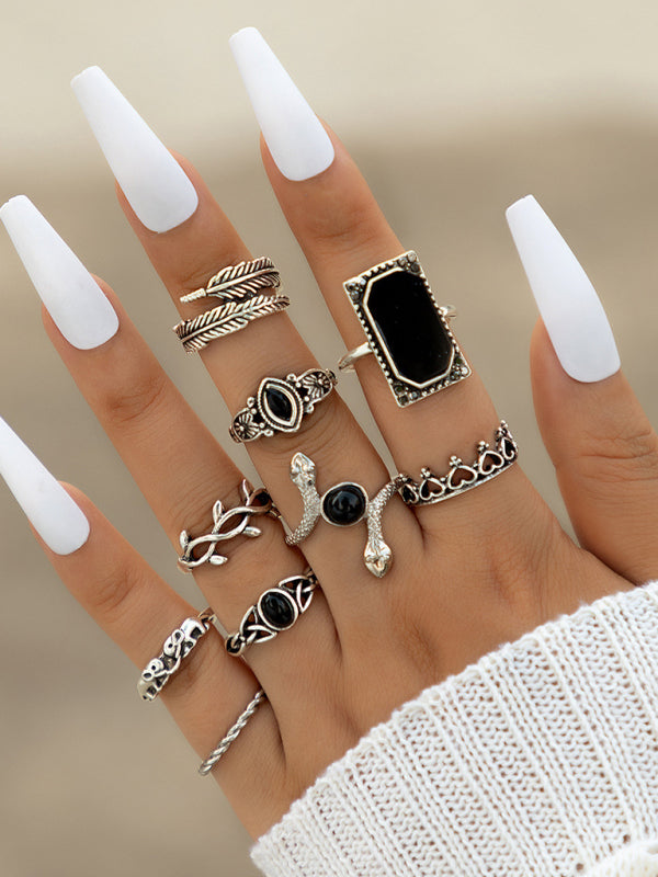 Jewelry 15-piece ring personality hollow lotus sunflower geometric black stone set ring - FashionistaDeal