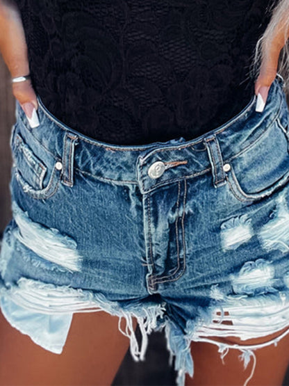 Women's high waist ripped denim shorts.