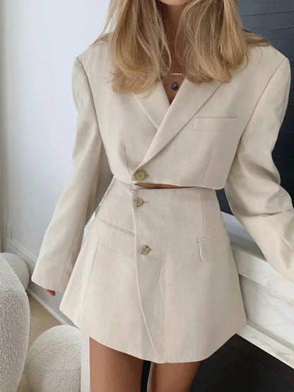 Women's diagonal button short blazer + high waist pocket skirt suit